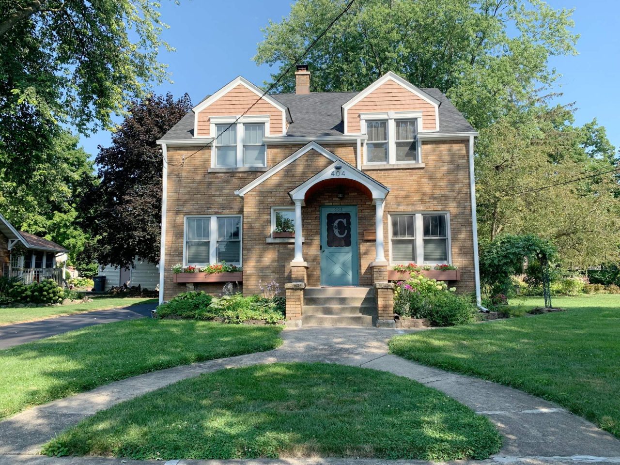 Lockport Illinois Home with Colored Door and Window boxes